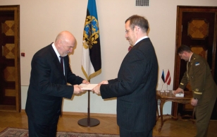 Presenting the Latvian Prime Minister Ivars Godmanis with the Order of the Cross of St. Mary's Land