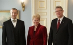 Lithuania's President Dalia Grybauskaite greets Estonia's President Toomas Hendrik Ilves.