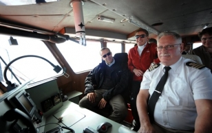 President Ilves, Mayor of Viimsi Municipality Haldo Oravas and Captain Johanson on the pilot boat to Prangli Island.