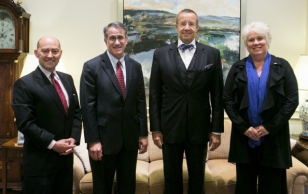 From left, Fletcher School Dean James Stavridis, Tufts President Anthony P. Monaco, Estonian President Toomas Hendrik Ilves and Estonian Ambassador to the United States Marina Kaljurand, F95, pose for a photo in Monaco's office on Sept. 25, 2013.