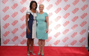 First Lady Michelle Obama greets Mrs. Evelin Ilves of the Republic of Estonia, before a luncheon for the spouses of United Nations leaders at the Studio Museum in Harlem, in New York, N.Y., Sept. 24, 2013.